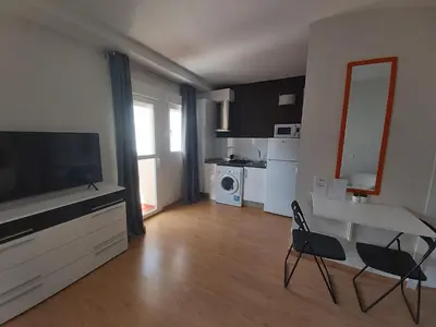 Una cocina o zona de cocina en APARTAMENTOS SANTA JULIANA