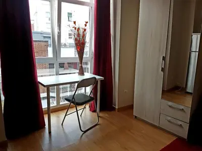 Una cocina o zona de cocina en APARTAMENTOS SANTA JULIANA