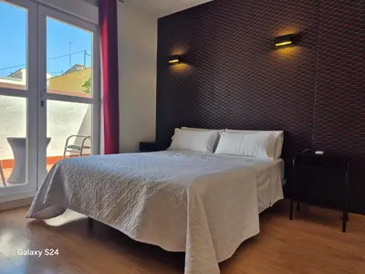 Cama o camas de una habitación en APARTAMENTOS SANTA JULIANA