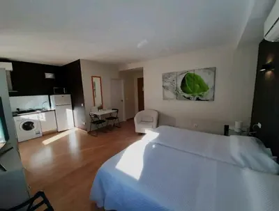 Cama o camas de una habitación en APARTAMENTOS SANTA JULIANA
