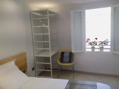 Cama o camas de una habitación en Hostal Palacio Luna