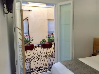 Cama o camas de una habitación en Hostal Palacio Luna
