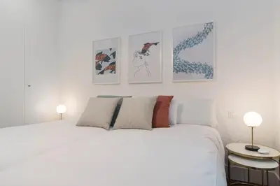 Cama o camas de una habitación en Preciados Gran Via Luxury Callao
