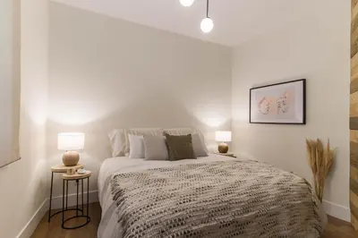 Cama o camas de una habitación en Preciados Gran Via Luxury Callao