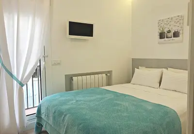 Cama o camas de una habitación en EXCLUSIVO Y LUMINOSO PISO EN EL PARQUE DEL RETIRO