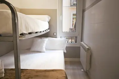Cama o camas de una habitación en For You Rentals Apartment TEMPORAL Madrid Paloma-La Latina PAL41