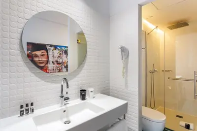 Un baño de One Shot Prado