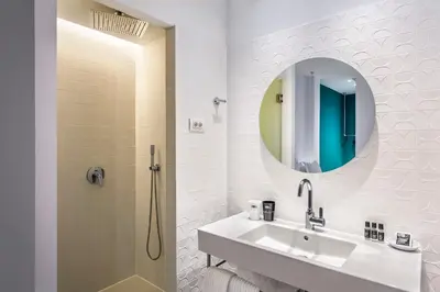 Un baño de One Shot Prado