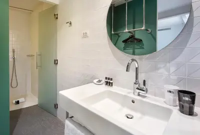 Un baño de One Shot Prado