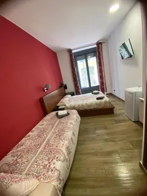 Cama o camas de una habitación en Hostal Corazón de Madrid 1
