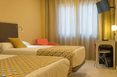 Cama o camas de una habitación en Hotel Sancho