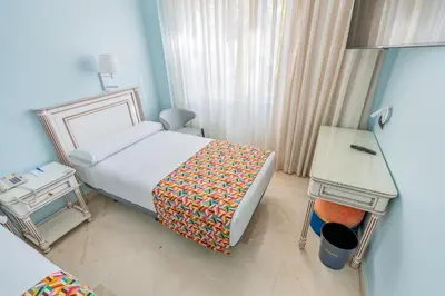 Cama o camas de una habitación en Hotel Sancho