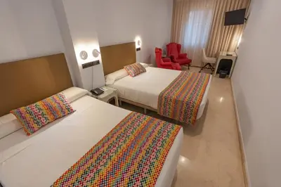 Cama o camas de una habitación en Hotel Sancho