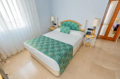 Cama o camas de una habitación en Hotel Sancho