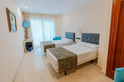 Cama o camas de una habitación en Hotel Sancho