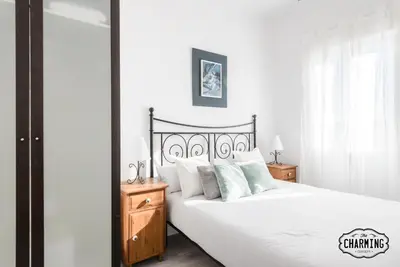 Cama o camas de una habitación en Antiques Market - Apartamento de 3 dormitorios con Parking