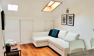 Zona de estar de CHUECA Apartamentos Noxi