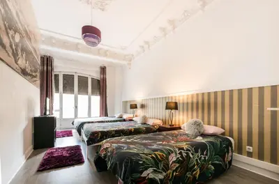 Cama o camas de una habitación en M&F 7 ROOMS/7 BATHROOMS OVER GRAN VIA