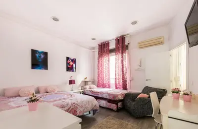 Cama o camas de una habitación en M&F 7 ROOMS/7 BATHROOMS OVER GRAN VIA