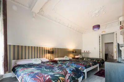 Cama o camas de una habitación en M&F 7 ROOMS/7 BATHROOMS OVER GRAN VIA