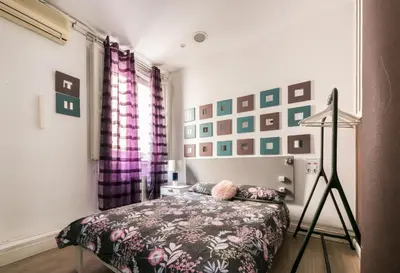 Cama o camas de una habitación en M&F 7 ROOMS/7 BATHROOMS OVER GRAN VIA