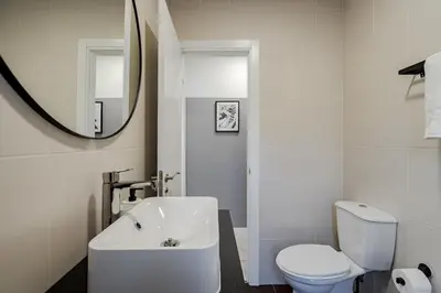 Un baño de MAD Apartments by Olala Homes
