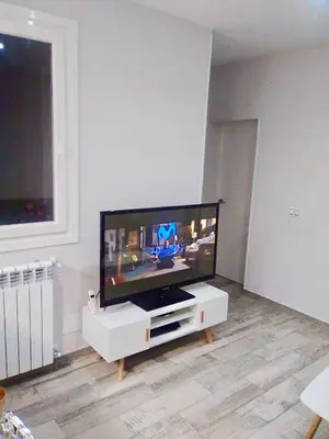 Una televisión o centro de entretenimiento en Apartamento estilo nórdico en Malasaña (Madrid Centro)