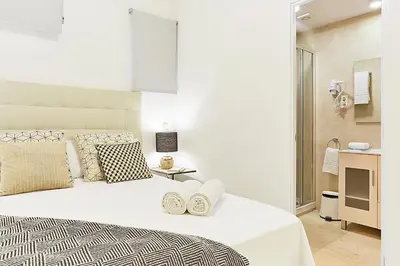 Cama o camas de una habitación en LEEWAYS LOFT IV in GRAN VÍA