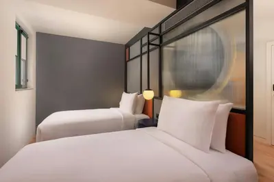 Cama o camas de una habitación en Aloft Madrid Gran Via