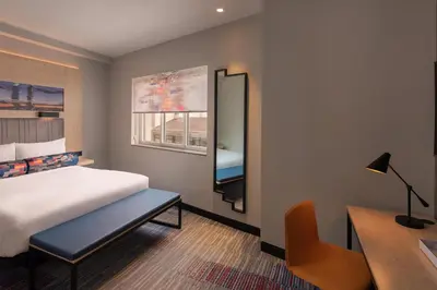 Cama o camas de una habitación en Aloft Madrid Gran Via