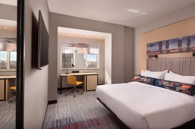 Cama o camas de una habitación en Aloft Madrid Gran Via