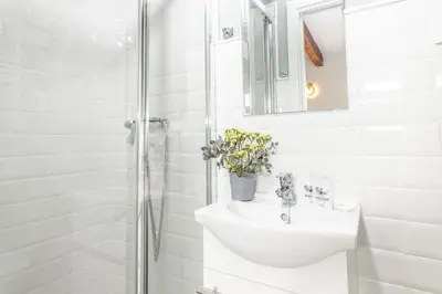 Un baño de Waou Chamberi IV - Alquiler Corta Duración