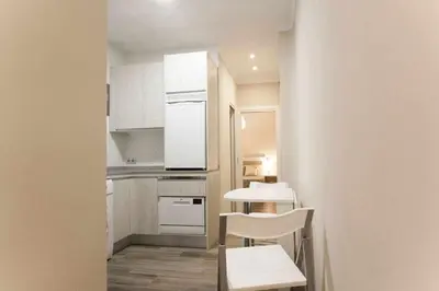 Una cocina o zona de cocina en NEW. Moderno y elegante apartamento céntrico.