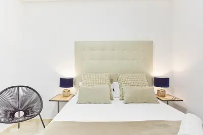 Cama o camas de una habitación en LEEWAYS APARTMENT II in GRAN VÍA