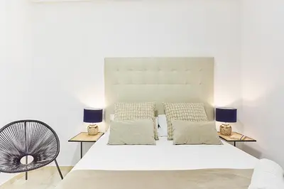 Cama o camas de una habitación en LEEWAYS APARTMENT II in GRAN VÍA