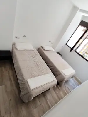 Cama o camas de una habitación en Palafox 23