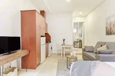 Una televisión o centro de entretenimiento en LEEWAYS LOFT XXIII in GRAN VÍA
