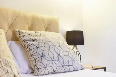 Cama o camas de una habitación en LEEWAYS APARTMENT XXIV in GRAN VÍA