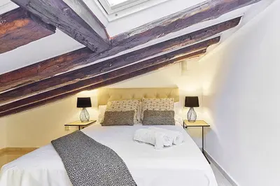 Cama o camas de una habitación en LEEWAYS APARTMENT XXIV in GRAN VÍA