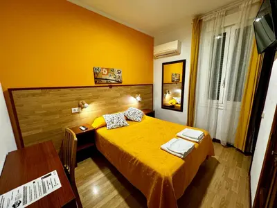 Cama o camas de una habitación en Hostal Edreira