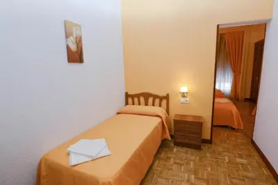 Cama o camas de una habitación en Hostal Edreira