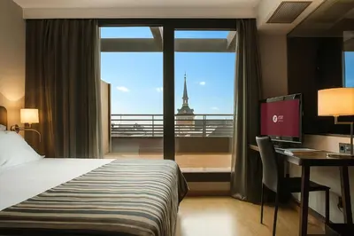 Cama o camas de una habitación en Exe Moncloa