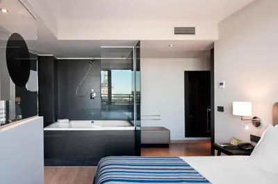Cama o camas de una habitación en Exe Moncloa