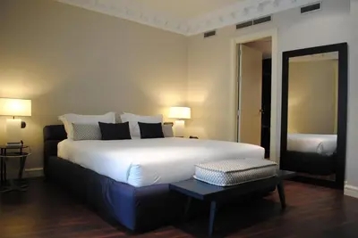 Cama o camas de una habitación en Hotel Sardinero Madrid