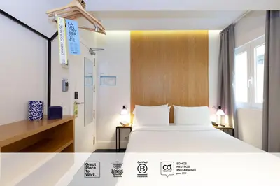 Cama o camas de una habitación en SLEEP'N Atocha - B Corp Certified