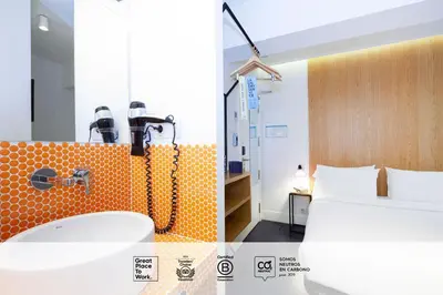 Cama o camas de una habitación en SLEEP'N Atocha - B Corp Certified