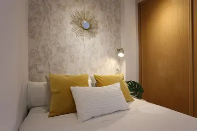 Cama o camas de una habitación en Atocha Art Apartment