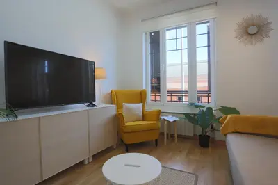 Una televisión o centro de entretenimiento en Atocha Art Apartment