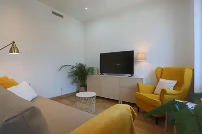 Una televisión o centro de entretenimiento en Atocha Art Apartment