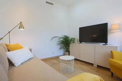 Una televisión o centro de entretenimiento en Atocha Art Apartment